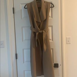 Long felt sleeveless duster in camel